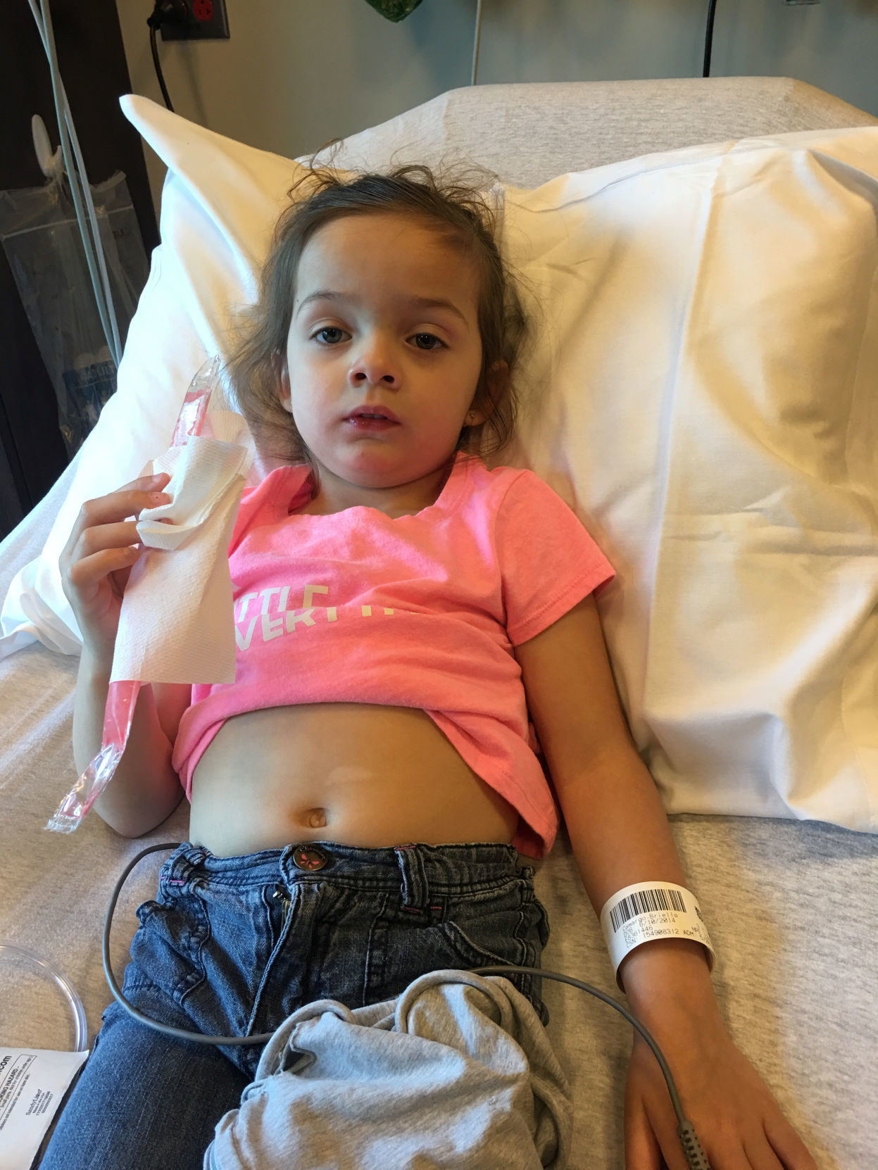 Janna Driver's daughter Birella, receives treatment after being admitted to hospital with difficulty breathing in Oklahoma City in this handout photo